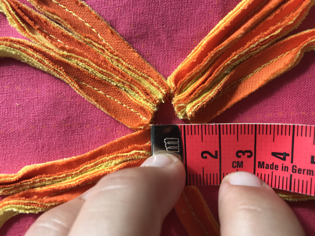 Measuring actual butterfly body width.