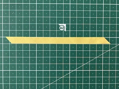 Stripe of fabric for butterfly antennae.