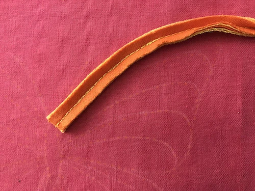 First bias cut stripe sewn to base cotton fabric.