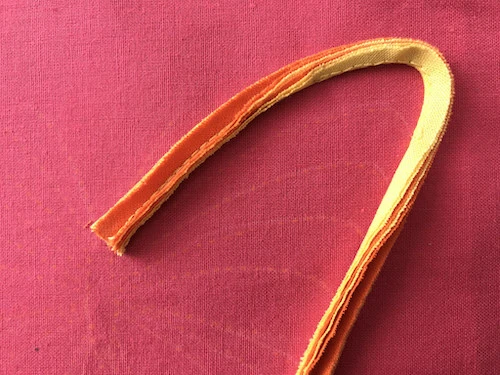 Bend bias cut stack stripe.