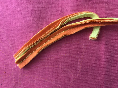 Second part of butterfly wing sewn to base fabric.