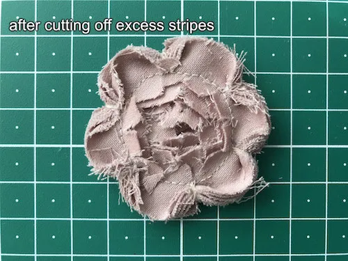 Faux-chenille style flower after cutting off excess stripes of fabric.