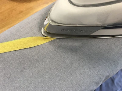 Pressing one third of butterfly antennae fabric stripe..