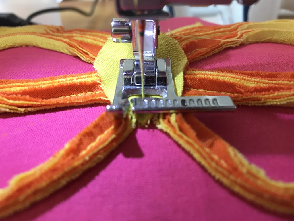 Sewing basted butterfly body.