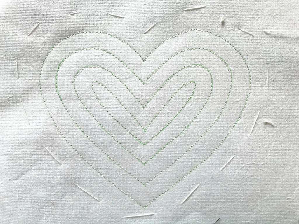 Heart template sewn with an iron-on and tear-off stabiliser.