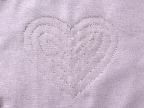 Sewn heart template traced directly to the fabric.