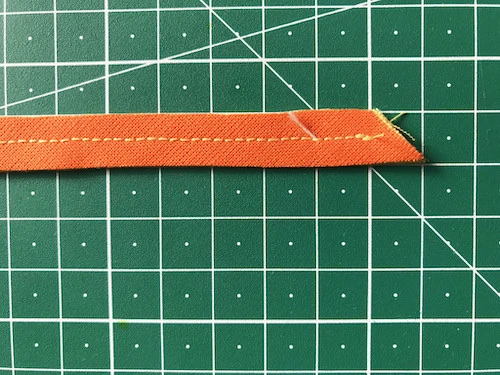 Stripe of stacked fabric with pointy end.